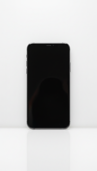 Glass-and-metal 5G smartphone — photo 1